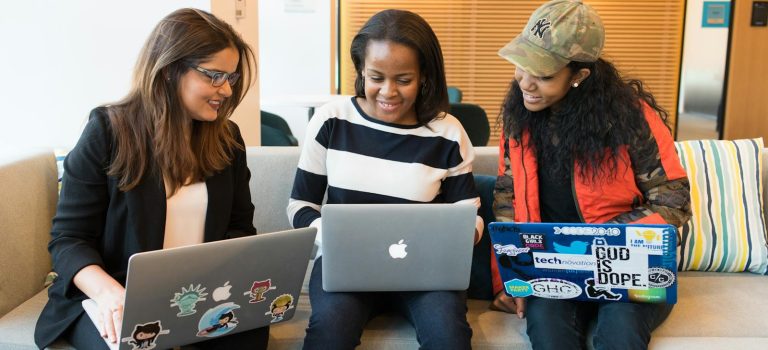 Three Woman in Front of Laptop Computer